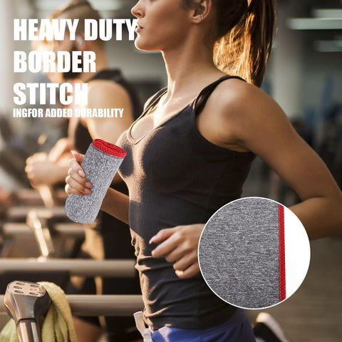 Woman holding Five Pack Quick Dry Microfiber Gym Towel, heavy duty stitching, grey 16x27 inches, in gym environment.