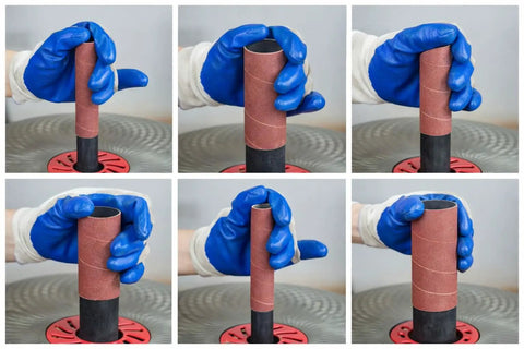 Hands using Heavy Duty Aluminum Oxide Spindle Sander Sleeves Six Pack Assorted Diameters 1/2 To 3 Inches for detailed sanding.