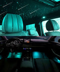 Car interior with 6W RGBW Meteor Fiber Optic 3 in 1 Lights Kit, shooting star effect on ceiling, illuminated dash, black seats