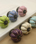 Super Slick Vintage Ceramic Pumpkin Cabinet Knobs 6 Piece Set in various colors, 40mm ivory and bright ceramic drawer pulls.