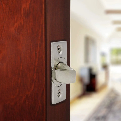 Close-up of Smooth Operator Passage Door Latch with satin nickel finish on wooden door, showcasing adjustable spindle design.