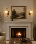 BOKT Battery Operated Light Wall Sconce 2 Pack Wireless Vintage Wall Light next to a cozy fireplace in a living room.