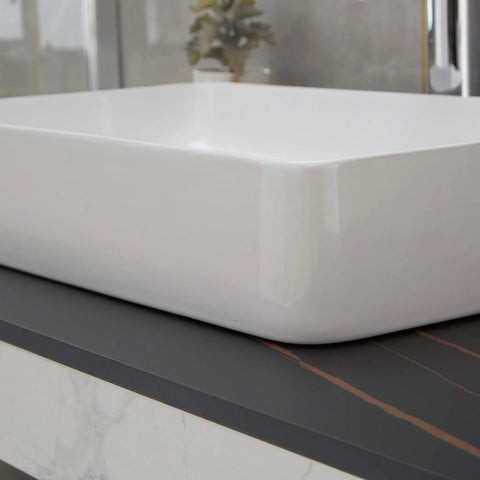 Close-up of Vessel Sink and Pop Up Drain Kit, 24 By 14 Inch Rectangular Above Counter White Porcelain Ceramic Bathroom Vanity Basin