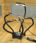 Five Flexible Soldering Helping Hands With 3X Magnifying Glasses, Third Arm Tool for Crafts, on pentagram base holding circuit board