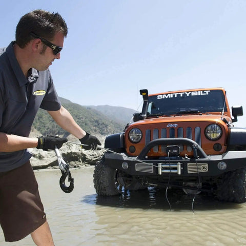 XRC Gen 2 9500lb Winch With Steel Cable For Heavy Duty Off Road Recovery 6.6HP Motor 12 Inch Remote Lead 93.5 Inch Wire Rope 3 Stage Gear Train Rugged All Terrain Beast For Jeeps And Trucks used to pull a Jeep in water