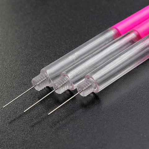 Close-up of Precision Watch Oil Filling Pen Oiler Tool for Clock Gears, fine tip lubricant pen with clear sections and pink accents.