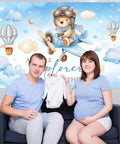 Airplane Baby Shower Banner With Little Explorer Vibe And Hot Air Balloons Boy Shower Backdrop 6 By 3 Point 6 Ft Photo Background Easy Hang Decor For A Fun Kid Friendly Party featuring a couple holding baby clothes