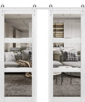 Built Tough Double Barn Doors Set 48 By 96 Inches With Clear Glass Three Lite Panels Matte White Finish in living room