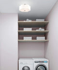 Three Light Brushed Nickel Ceiling Mount Fixture With Clover Shaped Off White Shade in laundry room setting