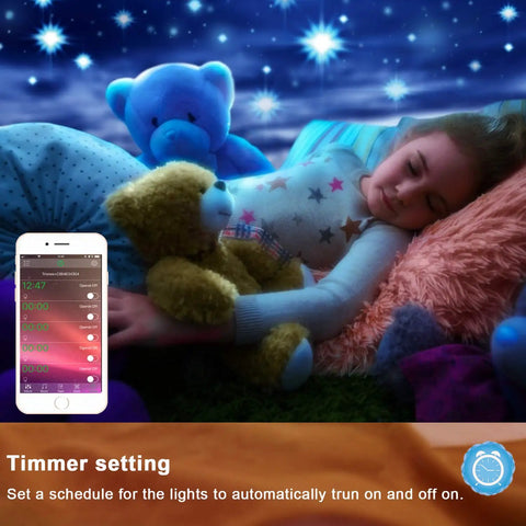 Child sleeping with Smart RGB Led Strip Lights for Bedroom 100 Ft with music sync remote, showcasing ambience with stuffed animals and night sky.