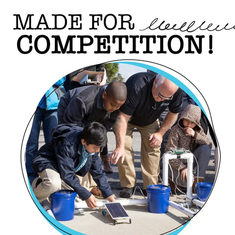 Ray Catcher Solar Vehicle Kit for STEM Projects, Sun Powered Car Build for Kids 12 and Up, DIY Sustainable Energy Race Kit, Lightweight Weather Resistant Solar Panel Setup for Junior Solar Sprint Race Ready. Students assembling a solar car on pavement.