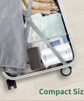 Ultra Compact 0.6L Electric Kettle Travel Ready On The Go Stainless Steel Mini Hot Water Boiler packed in suitcase