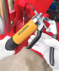 Person using Heavy Duty 8000 PSI Grease Gun Kit With Quick Release Coupler And One Hand Friendly Ergonomic Grip on machinery.