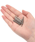 3x22mm Dowel Pins In 304 Stainless Steel, Round Head With Flat Chamfered End, 10 Pc Set held in a hand for size reference
