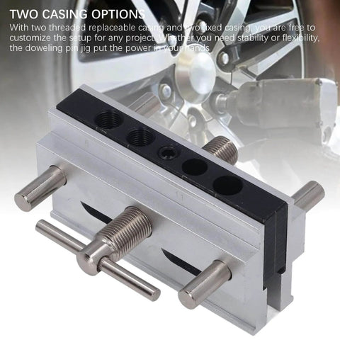 Self Centering Doweling Jig Kit With Adjustable Width Drilling Guide And Six Bushings, silver finish, shown from side view.