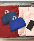 Two-Pack Lightweight Foldable Backpack Set Water-Resistant Packable 20L Travel Hiking Bags Navy Blue and Royal Blue in Suitcase