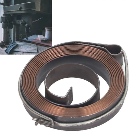 Close-up of Pro Grade Drill Press Return Spring Set Beefy Two Piece Steel Feed Return Coil Assembly with drill in background.