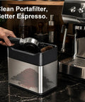 Top Shelf Electric Portafilter Cleaner With Automatic Dual Brush Fits 51mm And 58mm Filters, cleaning coffee grounds from portafilter.
