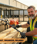 Person using Heavy Duty Self Retracting Tie Down Straps 4 Pack No Drama Auto Retract System to secure wood on a truck.