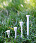 Unisex Golf Tees 50 Pack 2.125 Inch White Wooden Tees With Lead Free Paint Pro Grade Performance And Durability in grass