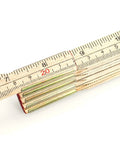 Close-up of Foldable Wood Ruler 6 Ft 6 In With US And Metric Measurements, showing 20 cm mark and hinge detail.
