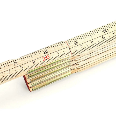 Close-up of Foldable Wood Ruler 6 Ft 6 In With US And Metric Measurements, showing 20 cm mark and hinge detail.
