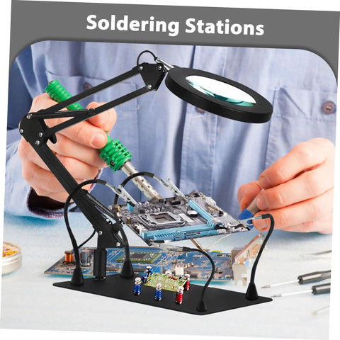 Six Piece Flexible Soldering Alligator Clamps With Third Hand Tool And Magnifying Lamp For PCB Work And Electronics Repair Adjustable Arms For Precise Hands Free Assembly And Workshop Convenience in use on circuit board