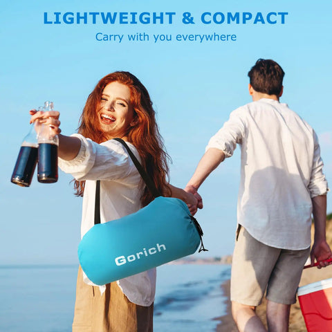 Couple carrying Portable Beach Tent For 3 To 7 People, UPF 50 Plus Sun Shelter With Easy Setup, Windproof Shade bag on beach