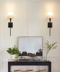 Two Pack Battery Operated Wall Sconces With Remote Control, Dimmable Brightness From 10 to 100 Percent, black finish, in hallway