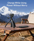 Magnetic Quick Release Charging Mount For DJI Osmo Nano on tripod with power bank, foldable base visible, outdoor setup.