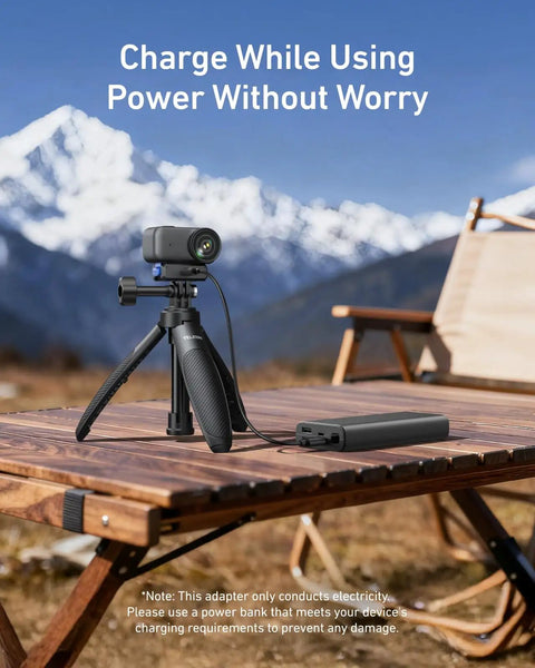 Magnetic Quick Release Charging Mount For DJI Osmo Nano on tripod with power bank, foldable base visible, outdoor setup.