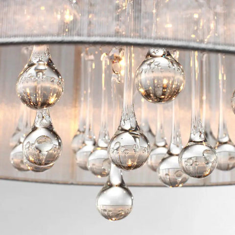 Raindrop Crystal Drum Chandelier With Fabric Shade close-up, showcasing K9 crystal raindrops elegantly hanging