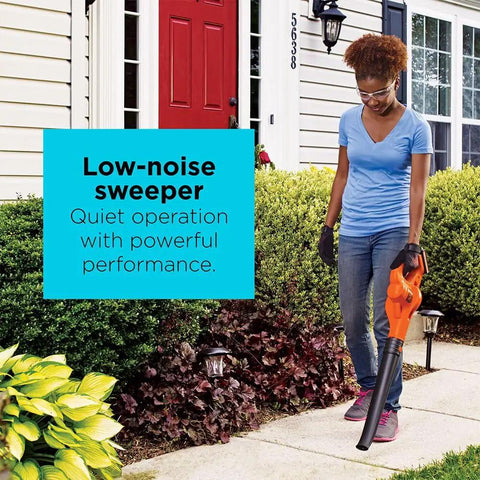 Person using Cordless 20V Max String Trimmer Edger And Sweeper Combo Kit for easy yard cleanup in front of house