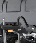 Close-up of Exhaust Hanger Removal Tool and 4 Hole Rubber Hangers Kit for Cars Trucks, showing tool in use with engine components.