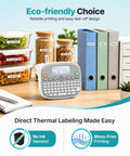 Top Shelf Qwerty Label Maker Featuring Waterproof Build And Portable Slick Design With Type C And Battery Power For Stress Free Home Office Organization Including One White 12mm Core Tape on a desk surrounded by organized food and documents.