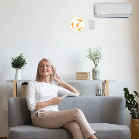 Woman sitting on sofa with visible outlet using 46 Pack Outlet and Wall Plates Insulation Sealer Set for Weatherproofing and Energy Saving