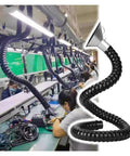 Top Shelf Flexible Dust Collection Hose With Rock Solid Articulated Suction Tube And Easy Swivel Arm For Handling Hot Solder Fumes In Your Favorite Home Workshop Setup, featuring flexible black tubing in a workshop.