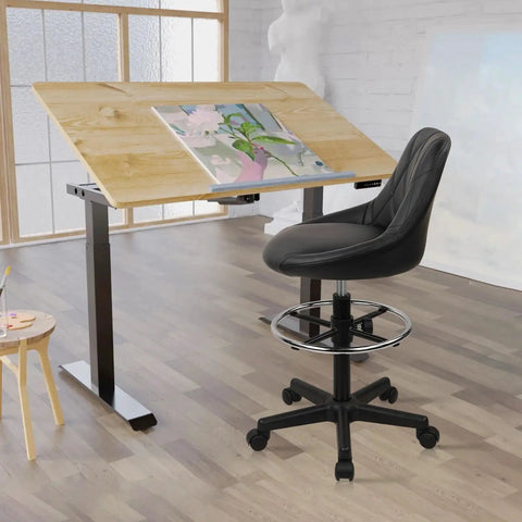 Drafting Chair With Backrest And Wheels For Office And Workshop Use Boss Level Comfort Adjustable Height Footrest PU Leather Tall Swivel Stool For Kitchen Islands And Home Bars Easy Rolling Casters Black 1 Pack next to a drafting table in a modern workspace