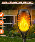 8 Pack Outdoor Solar Torch Lights With Realistic Flickering Flame in rain by garden, waterproof and heat resistant design