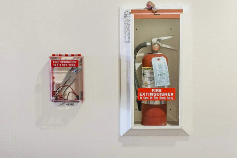 High Vis Wall Case For Fire Sprinkler Shut Off Tool Heavy Duty Polycarbonate showing shut-off tool mounted next to fire extinguisher.