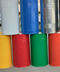 Built Tough Thickened Steel Drum Rack For Heavy Duty Oil Barrel Storage With Non Slip Pads And Reinforced Frame Shop Grade Warehouse Ready Solution with multiple colored barrels stacked.