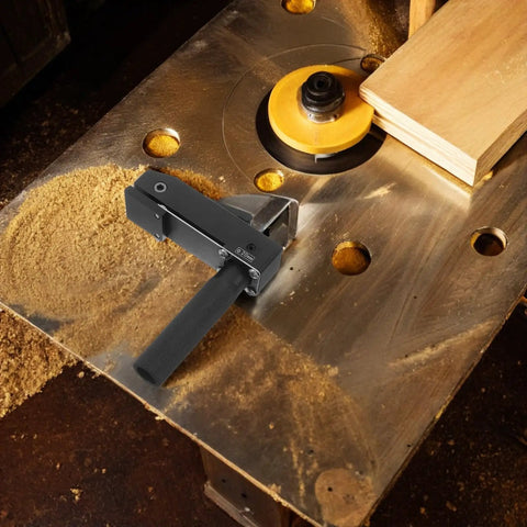 Compact Portable Aluminum Woodworking Clamp With Quick Clamping Function on workbench with wood shaving