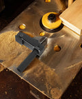 Compact Portable Desktop Clip Clamp for woodworking on a workbench with quick clamp aluminum alloy build shown in woodshop setting