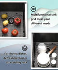 Stainless Steel Sink Grids Set of 2, 13 x 11-5/8 Inches, seen in use drying vegetables and dishes in kitchen sink