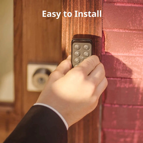 Hand installing Smart Keypad Touch That Delivers Keyless Entry And Fingerprint Access, IP65 Waterproof Home Security Pad on door