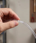 Up Your Game With These 10 Plastic Barb Connector Hose Repair Kits For Quick Fixes On Fountain Tubes And Washing Machine Inlets Inside Your Home Irrigation Systems clear plastic hose connector in hand