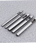 Leather Round Punch Tool Belt Hole Punch For Falconry Hobbies Crafts And DIY Projects, shiny steel punch set on grey surface