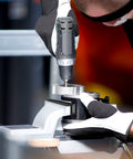 Magnetic 4 Inch Vise Jaws Set With Soft Rubber Pads in use with electric drill on metal part, black universal protector pads visible