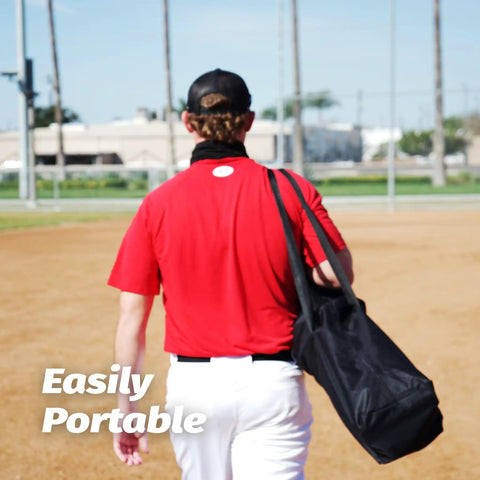 Person carrying portable bag for 12x9 Foot Barricade Backstop Net For Baseball Softball Lacrosse Soccer Basketball And More Durable 5 Ply Knotless Netting Black Practice Barrier Net For Backyard Or Field Training