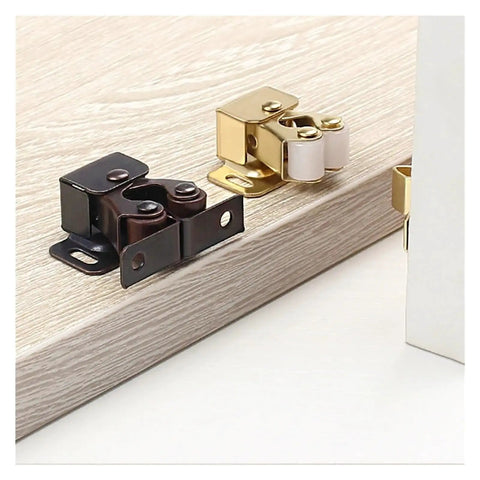Stainless Steel Cabinet Latches 18 Pcs Dual Wheel Spring Catches Self Locking Hardware For Cupboard, Drawer And Wardrobe Door Fix Fitting, showing black and bronze latches on a wooden surface.
